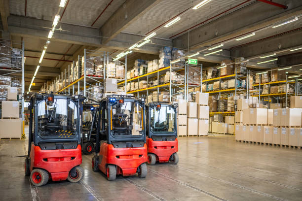 istock Forklift vehicles in warehouse with no people 2006314223