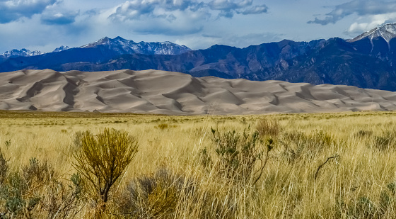Great Sand Dunes with mountains in the background, Colorado, USA