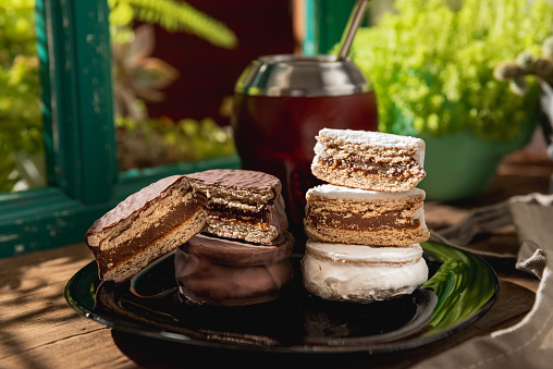 Argentine Alfajor with chocolate and meringue filled with dulce de leche