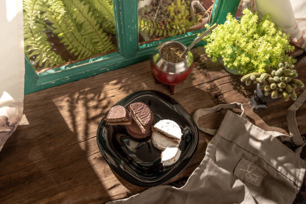 istock Argentine Alfajor with chocolate and meringue filled with dulce de leche 2006375574