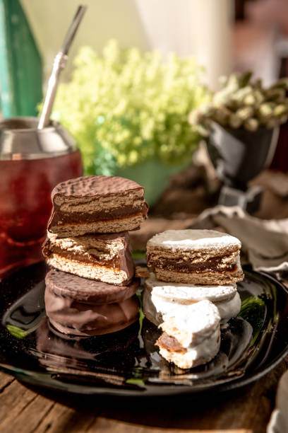 istock Argentine Alfajor with chocolate and meringue filled with dulce de leche 2006375580