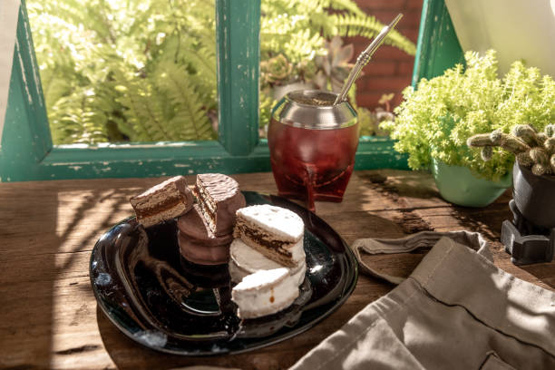 istock Argentine Alfajor with chocolate and meringue filled with dulce de leche 2006375582
