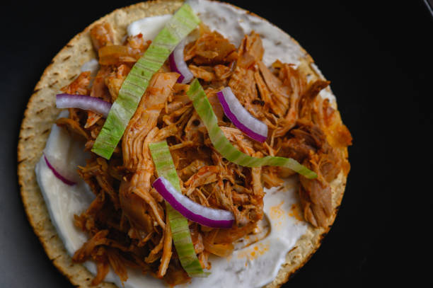 istock Tostada with Mexican Chicken Tinga, Tinga de Pollo 2006398533