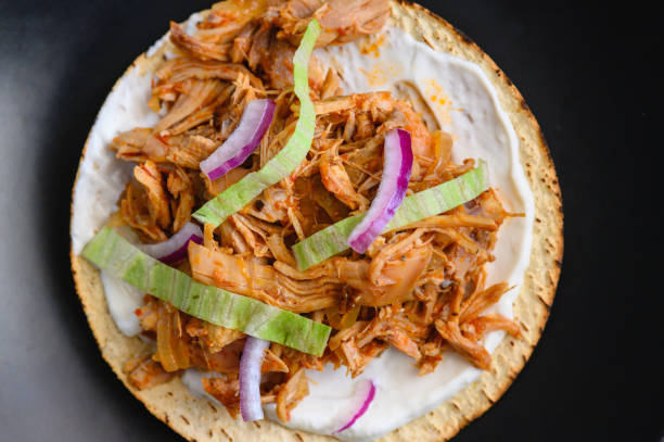 istock Tostada with Mexican Chicken Tinga, Tinga de Pollo 2006399049