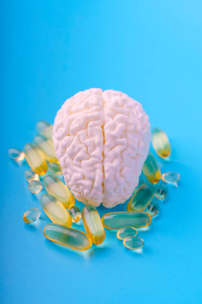 istock Concept model of the brain next to omega 3 capsules 2006431707