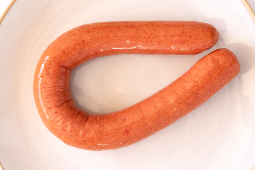 Uncooked Beef Sausage Ring on a Plate