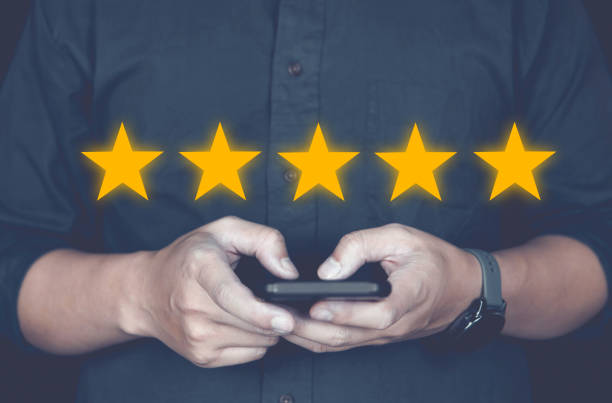 istock Customer review good rating concept, hand pressing user and five star icon on visual screen for positive customer feedback, testimonial and testimony, 2006462922