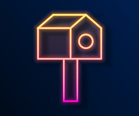 Glowing neon line Bird house icon isolated on black background. Nesting box birdhouse, homemade building for birds. Vector.