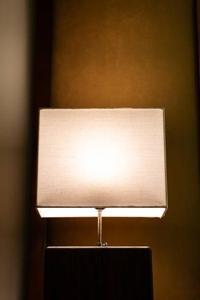 istock Luminous modern bedsides lamp at night. 2006572086