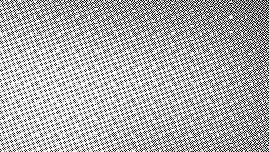 Grunge halftone background with dots.