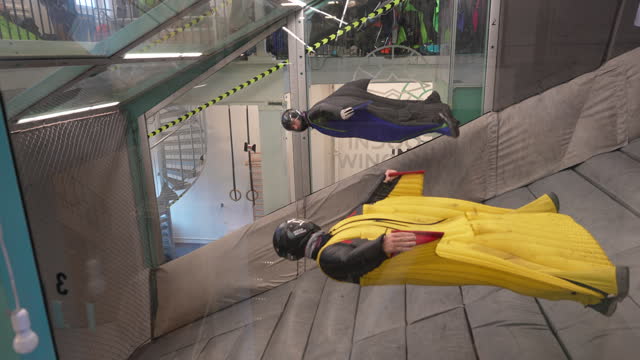 Wingsuit fliers train in wind tunnel