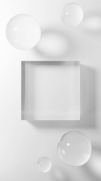 istock 3D Illustration.Transparent cubic glass base and sphere on white background. Overhead view. (Vertical) 2006810051