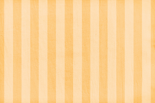 Vector illustration of striped backgrounds textured painted wall or paper sheet. There are narrow parallel stripes all over the light brown and beige background. Apt for use as background, wallpapers, wrapping paper, poster backdrops.