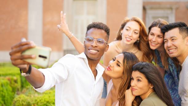 istock Multicultural group of friends taking a selfie 2006858009
