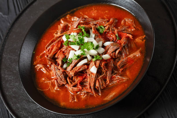 istock birria de res, mexican beef stew in pepper sauce 2006900595