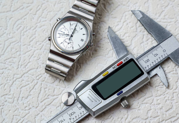 Metal vernier caliper on white background