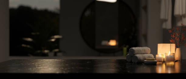 istock A display space on a black tabletop in a modern dark bathroom at night. 2007016242