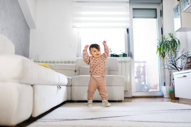 istock First steps of baby girl 2007024119