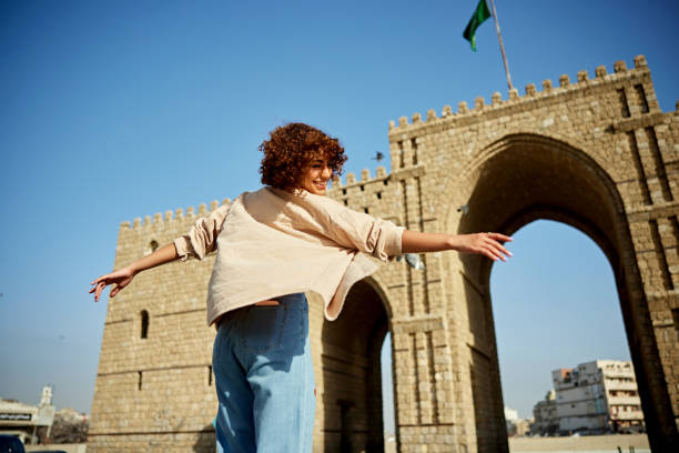 Young Middle Eastern tourist visiting Baab Makkah in Jeddah
