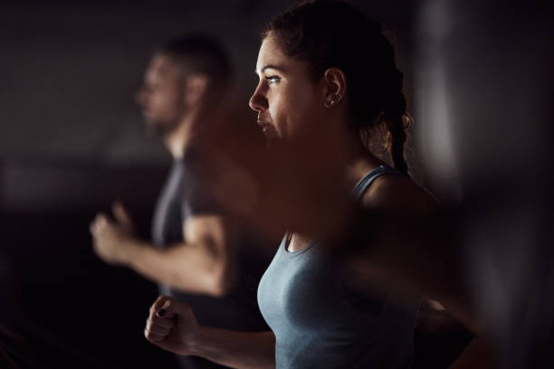 istock Athletic woman warming up in a gym. 2007057796