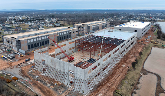 Aldie, Virginia, United States - February 10, 2024: Construction of Amazon Mid-Atlantic Region data center in Northern Virginia, Loudoun County, USA . Amazon, is an American technology company  with focus on e-commerce, cloud computing, digital advertising, streaming, and artificial intelligence.