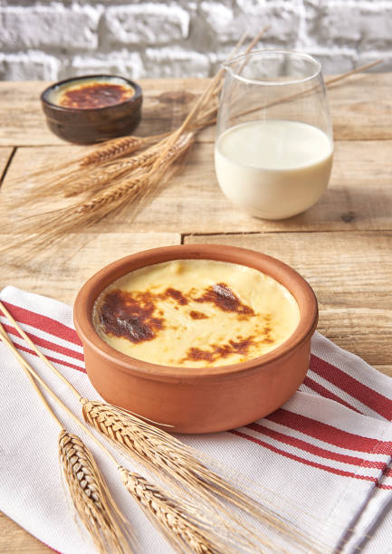 istock Rice pudding close up wooden table background and milk. 2007098874