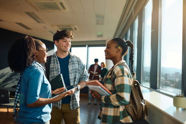 istock Multiracial group of happy college students talking in the classroom. 2007099410