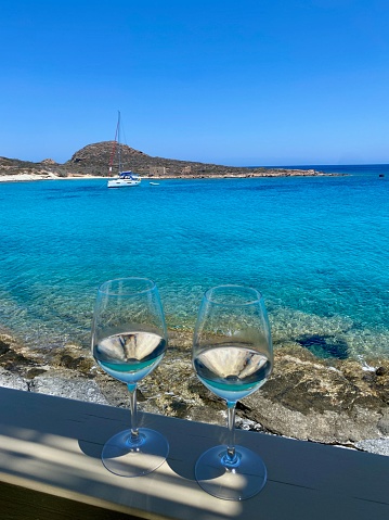 2 Glasses of wine in a Greek island