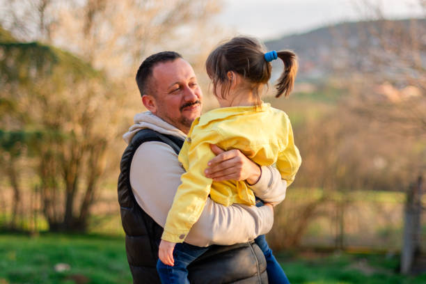 istock Happy father holding his little daughter. 2007133870