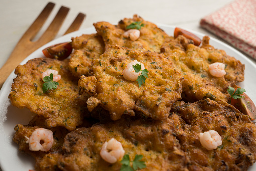 Tortitas de Camarones. Traditional tapa of flour and egg dough with shrimp or prawns, very famous in the Cadiz area in Spain..