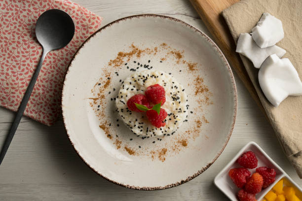 istock Raspberry Sticky Rice. Sticky rice cooked with coconut milk with fresh fruit. 2007147832