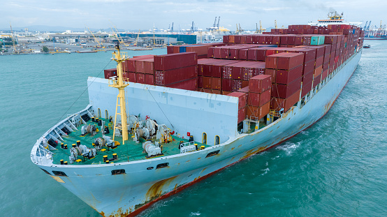 Santos, São Paulo - Brazil - January 29, 2011: CMA CGM ship Kingston, Monrovia loaded with containers at terminal 37 of the port of Santos, Brazil.