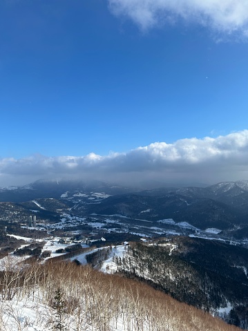 Tomamu is a modern, high-class ski resort in central Hokkaido, about 90 minutes by train south of Sapporo. The resort covers two mountains and has a large selection of trails to choose from.