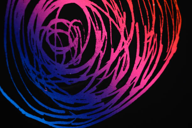 Background of pink scribbles, swirl in different shades on black background