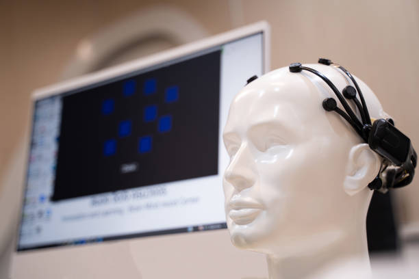 istock Simulate wearing brain scanning waves, medical equipment In the laboratory with monitors showing reading and brain 2007172002