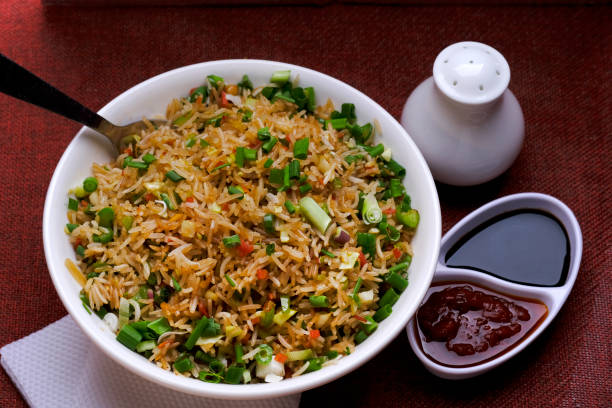 istock Chinese Cuisine - Fried Rice with Vegetables, fried rice in plate on table 2007196886