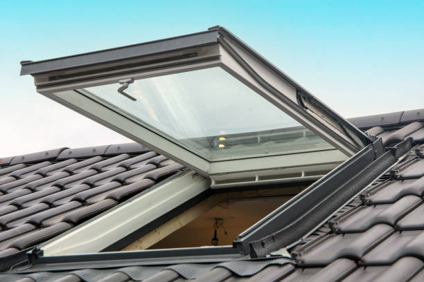 istock New skylight on a newly tiled roof 2007248476