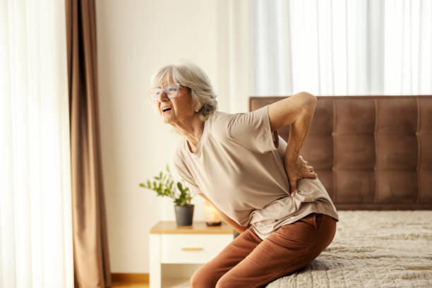 istock A senior woman is having backache and trying to get up. 2007286076