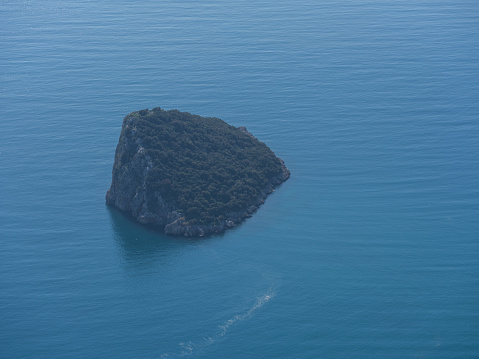 a tropical island in the middle of the sea