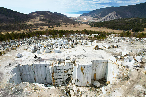 Abandoned Marble Quarry with view of lake Baikal in the village of Buguldeika from air.