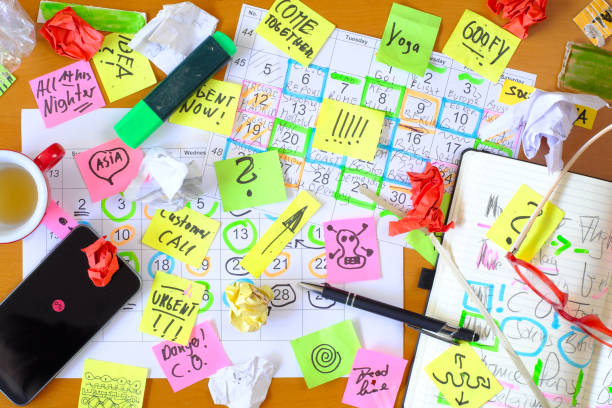 istock Calendars with business appointments and adhesive notes on cluttered desk. Business concept,beat the clock,overwoked,bureaucracy 2007341652