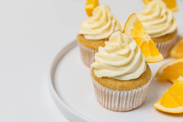 istock Group of orange cupcakes on plate 2007365044