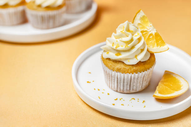 istock Citrus flavored orange cupcakes with frosting 2007365048