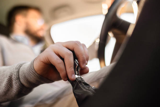istock Man driving his car ,focus on a gearshift 2007371531