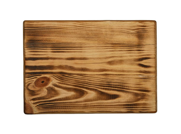 istock Brown wooden cutting board isolated on white 2007375883