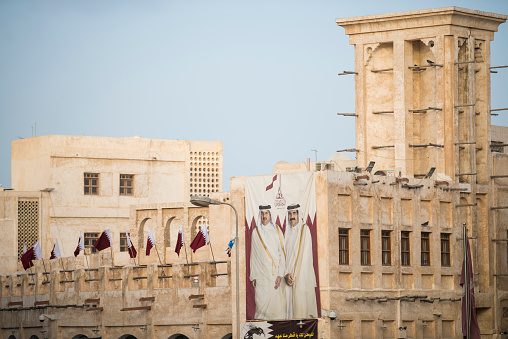 Doha, Qatar - December 18,2017. Hamad bin Khalifa al-Thani and Tamim bin Hamad Al Thani posters on the occasion of Qatar National Day.