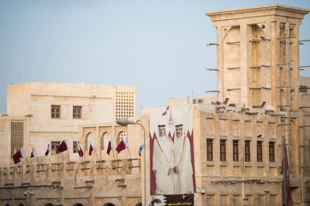 Hamad bin Khalifa al-Thani and Tamim bin Hamad Al Thani poster. Doha, Qatar - December 18,2017. Hamad bin Khalifa al-Thani and Tamim bin Hamad Al Thani posters on the occasion of Qatar National Day. qatar emir stock pictures, royalty-free photos & images