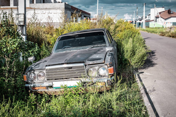 istock Old abandoned retro car in the garden 2007401456