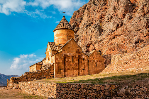 Ancient old Noravank Armenian monastery in the rocky mountains in sunlight. Religion theme