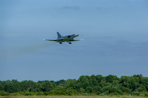 Tu-22M3 aircraft (NATO - Backfire) missile-carrying bomber perform demonstration flight.. Preparations for celebration of 100th anniversary of Russian Air Force. VillageTown, Russia, June 18, 2012